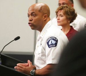 Acting Police Chief Medaria Arradondo announces that Minneapolis police will be required to have their body cameras on when they respond to all calls, as well as in certain other situations during a news conference as Mayor Betsy Hodges looks on, Wednesday, July 26, 2017 in Minneapolis.