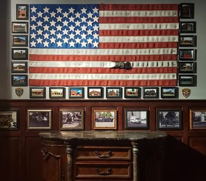 The business aims for a refined feel, with abundant wall decor featuring art, police and fire department memorabilia collected by the owners and donated by passionate members of the community. (Photo/Buffalo Station House)
