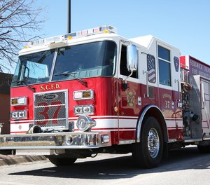 A Sedgwick County firefighter was injured after falling through ice while attempting to rescue a dog on Wednesday.