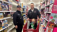 'It's a great way to give back': Ill. firefighters, cops go holiday shopping with kids