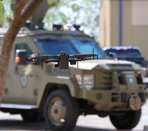 A Lemur S drone in flight to the Lenco Bearcat after searching a location.