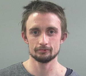Mitchell Bryce May, 29, was charged in the theft of an ambulance last week after being arrested in an unrelated case. Police say May was in possession of controlled substances and fired a Taser at officers while being arrested. One of the officers recognized May as the suspected ambulance thief caught on video.