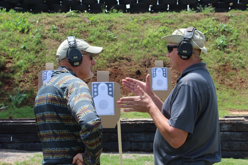 Accomplished instructor, shooter and Firearms Trainers Association representative, Steve Moses, tolerates some coaching from the author.