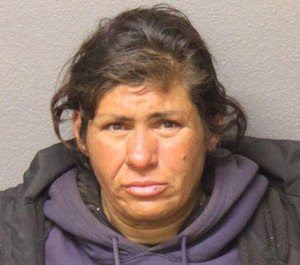 Teresa Ortiz, 45, is accused of setting the fire at a restaurant that injured a firefighter on Wednesday.