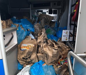 Some Penn Hills EMS staff put their ambulances to unique use by loading them up with food collected as part of the annual Stamp Out Hunger drive. (Photo/Penn Hills Paramedics IAFF Local 5167)