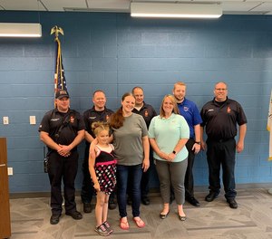 Kylee Shepherd, 7, called 911 and calmly listened and followed the dispatcher's instructions to help her mom through a seizure while she waited for paramedics to arrive. (Photo/Normal Fire Department)