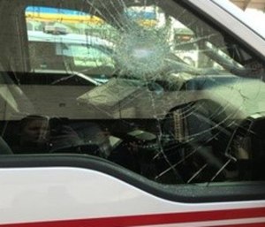 A Cincinnati Fire Service ambulance was parked at a curb when Bruce Diamond allegedly threw a rock at the window.