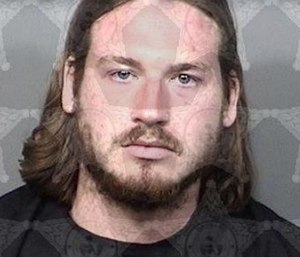 Scott Sampson was arrested after crashing into an ambulance while intoxicated with his infant son inside the vehicle.