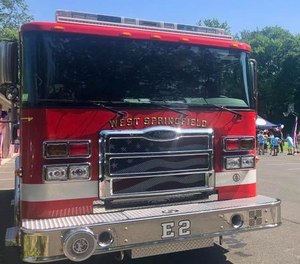 West Springfield firefighters used their Engine 2 to pull apart a wrecked car, freeing the trapped driver who was seriously injured in a head-on collision.