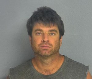 Police said Jason Hawkins lit his own home on fire in an effort to get revenge on a firefighter who was dating his ex-wife. (Photo/Greene County Sheriff's Office)