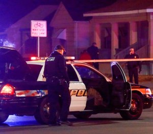 Wichita police investigate a call of a possible hostage situation near the corner of McCormick and Seneca in Wichita, Ks Thursday night 12/28.
