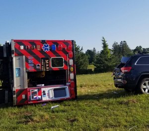 A car crossed the centerline and struck the ambulance head-on causing the emergency vehicle to veer into the eastbound lane, where it hit a Jeep head-on before coming to rest on its driver's side. (Photo/Falmouth Police Department)