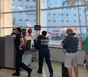 First responders go through security check point before entering the cruise ship on the way to the Bahamas. (Photo/Bahamas Paradise Cruise Line)