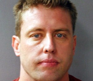 This file photo provided by the St. Louis Police Department shows former St. Louis police officer Jason Stockley, who is charged with first-degree murder and armed criminal action in the December 2011 shooting death of Anthony Lamar Smith.