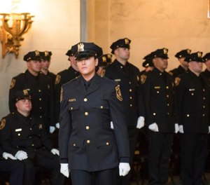 Kristen Hyman is sworn in during a June 8, 2017, ceremony for 27 new officers at the William J. Brennan Courthouse in Jersey City, N.J. (Reena Rose Sibayan /The Jersey Journal via AP)