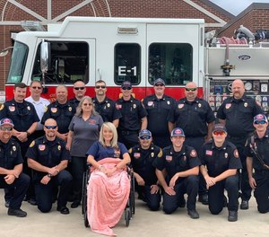 Paramedic Heather Haynes with members of the Lexington Fire Department after a visit and lunch with her colleagues. (Photo/Lexington Fire Department)