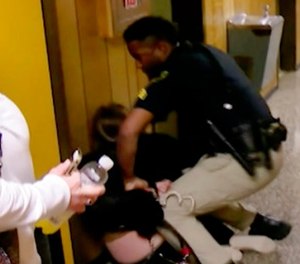 In this Monday, Jan. 8, 2018, image made from a video provided by KATC-TV middle-school English teacher Deyshia Hargrave is handcuffed by a city marshal.