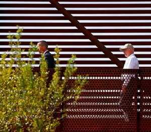 Attorney General Jeff Sessions, center, tours the U.S.-Mexico border with border officials, Tuesday, April 11, 2017, in Nogales, Ariz. (AP Photo/Ross D. Franklin)