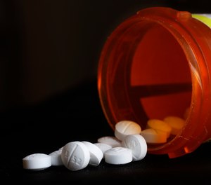 This Wednesday, Aug. 29, 2018 photo shows an arrangement of Oxycodone pills in New York.