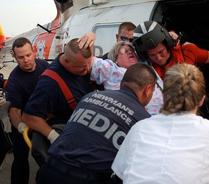 First responders are more prone to back injuries or sprains because of the amount of bending, kneeling and lifting required on the job. (Photo/U.S. Navy)