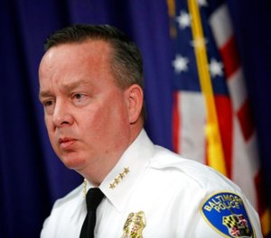 In this Tuesday, April 4, 2017 file photo, Baltimore Police Department Commissioner Kevin Davis speaks at a news conference at the department's headquarters in Baltimore, in response to the Department of Justice's request for a 90-day delay of a hearing on its proposed overhaul of the police department.