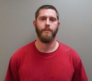 This undated image provide by the Paulding County Sheriff’s Office shows Branden Powell. Authorities say a manhunt is under way for Powell, an Ohio rape suspect who overpowered a sheriff’s deputy in a transport van and stole his gun and ammunition. (Paulding County Sheriff’s Office via AP)