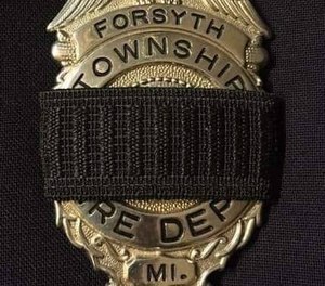 Forsyth Township officials identified Firefighter Ben Lauren, 23, as the firefighter killed in a duplex blaze on a former Air Force base Friday night. Lauren was a third-generation firefighter, and his father and sister serve with the same fire department. (Photo/Forsyth Township Fire Department Facebook)