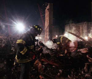 Firefighters from Staten Island's Rescue 5 company search for victims in the