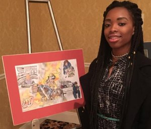 Jasmine Williams, from Edna Karr High School, with her winning poster. (Photo/of Jeneen Graves Williams)