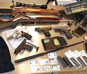 Police discovered a hoard of weapons for which he was not permitted.