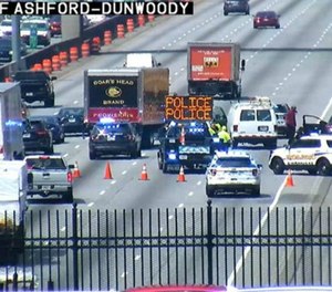 A police officer is recovering after being dragged behind a car on the highway by a fleeing suspect. (Photo/Georgia Department of Transportation)