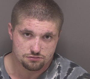 Joshua Eric Matlock, 24, is accused of stealing and burning an ambulance in July.