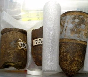 This photo provided by the Carlisle Police Department shows Civil War-era artillery shells that were discovered by a librarian at the Gleason Public Library in Carlisle, Mass., on Thursday, July 20, 2017.