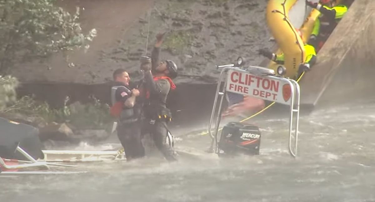 Watch Police helicopter rescues NJ FFs trapped in river