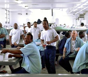 Inmates share a dormitory at the minimum-security Vandalia Prison in Vandalia, Ill. Five transgender women filed a class action lawsuit in 2018 regarding their treatment in the state's men's prisons.