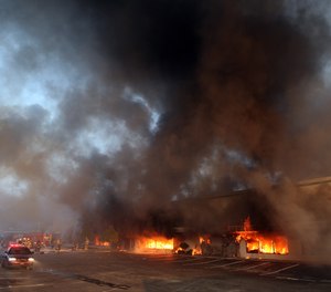 Smoke billows from the Sofa Super Store in Charleston, S.C., Monday, June 18, 2007.