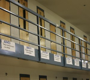 Character traits to work towards are listed on posters that line the common area of a medium security housing unit at Mabel Bassett Correctional Center in Mcloud, Okla., Friday, July 27, 2007.