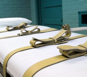 In this Tuesday, May 27, 2008 file photo, the gurney used to restrain condemned prisoners during the lethal injection process is shown in the Texas death house in Huntsville, Texas.