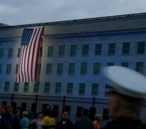A flag hangs from the Pentagon near the September 11 Pentagon Memorial. The author's son was serving at the Pentagon during the 2001 attacks.