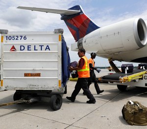 A Delta Airlines flight heading to California was diverted after a passenger assaulted two officials on board, including a Federal Air Marshal.