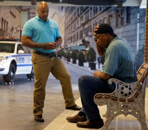 A New York City police officer talks to an actor during a Crisis Intervention Training class at the New York Police Department Police Academy in New York.