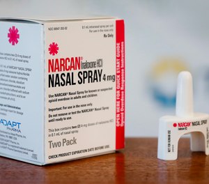 This Sept. 7, 2017 file photo shows a box of Narcan spray displayed after a news conference in Cincinnati.