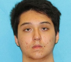 This photo provided by the Collin County District Attorney's office in Texas shows Matin Azizi-Yarand, a teenager from Plano, Texas, who has been charged with criminal solicitation of capital murder and making a terroristic threat.