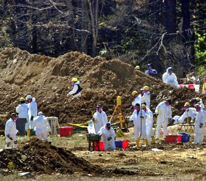 FBI investigators continue excavating the crash site of United Flight 93 in Shanksville, Pa.