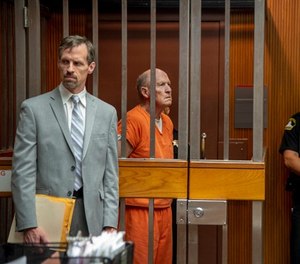Defense attorney Joe Cress stands next to his client Joseph James DeAngelo appears in Sacramento Superior Court, Friday, June 1, 2018, in Sacramento, Calif. He is suspected in at least a dozen killings and roughly 50 rapes in the 1970s and '80s.