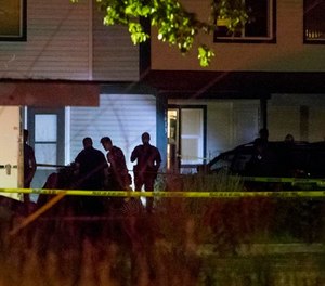 Boise police investigate at a crime scene near the corner of State and Wyle Streets in Boise just before 11:00 p.m. Saturday, June 30, 2018. (Darin Oswald/Idaho Statesman via AP)