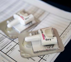 Can you safely allow a patient to refuse care on scene after a dose of intranasal naloxone? Are there other factors that may be assessed to help mitigate risk or prompt transportation for further care?