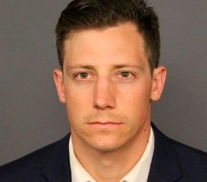 This undated file photo provided by the Denver Police Department shows Chase Bishop. Investigators say the FBI agent accidentally fired a weapon that fell while he was dancing at a Denver nightspot and wounded another patron in the leg. (Denver Police Department via AP, File)