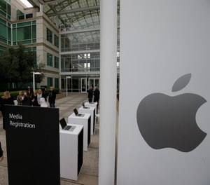 In this March 21, 2016 file photo, the exterior of Apple headquarters is seen before an event at the company's headquarters in Cupertino, Calif.
