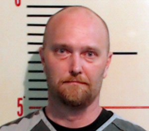 FILE - This file booking photo provided by the Parker County Sheriff's Office in Weatherford, Texas, shows Roy Oliver. The murder trial is set to begin Thursday, Aug. 16, 2018, for Oliver, a former Balch Springs, Texas, police officer, who opened fire into a moving car filled with black teenagers, killing a 15-year-old passenger in April 2017. (Parker County Sheriff's Office via AP, File)